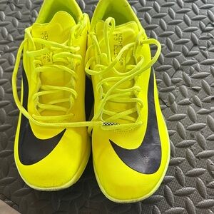 Nike women’s Neon Yellow track Cleats with Black Swoosh